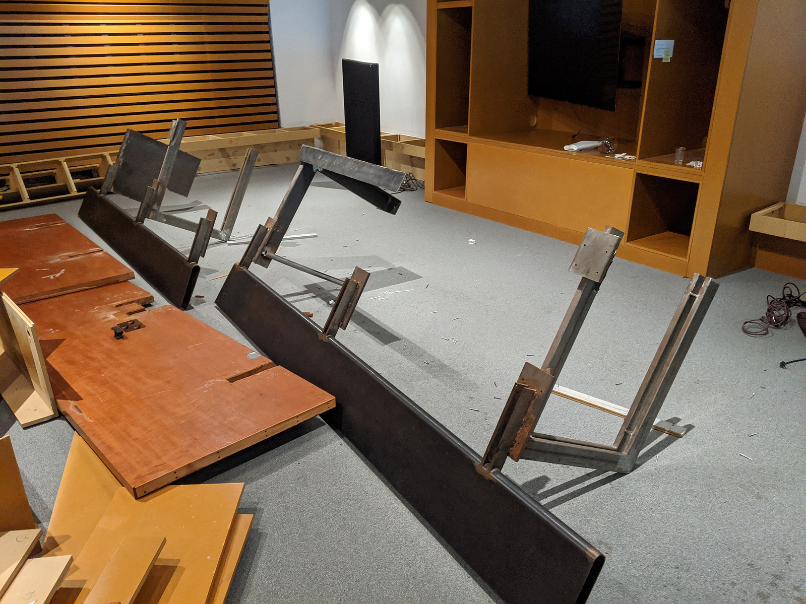 The after of the table once I had dismantled it. Because the main metal frame was brought into the room before it had its windows installed, I had to break it down even further to remove it.